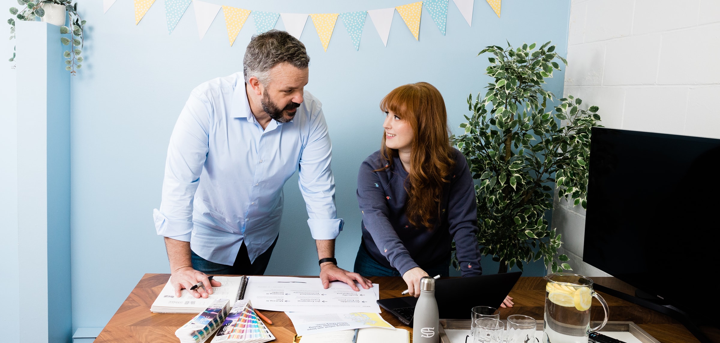 Ryan and Rachael Working at Steady Studio | Photo By: Mateus Studios